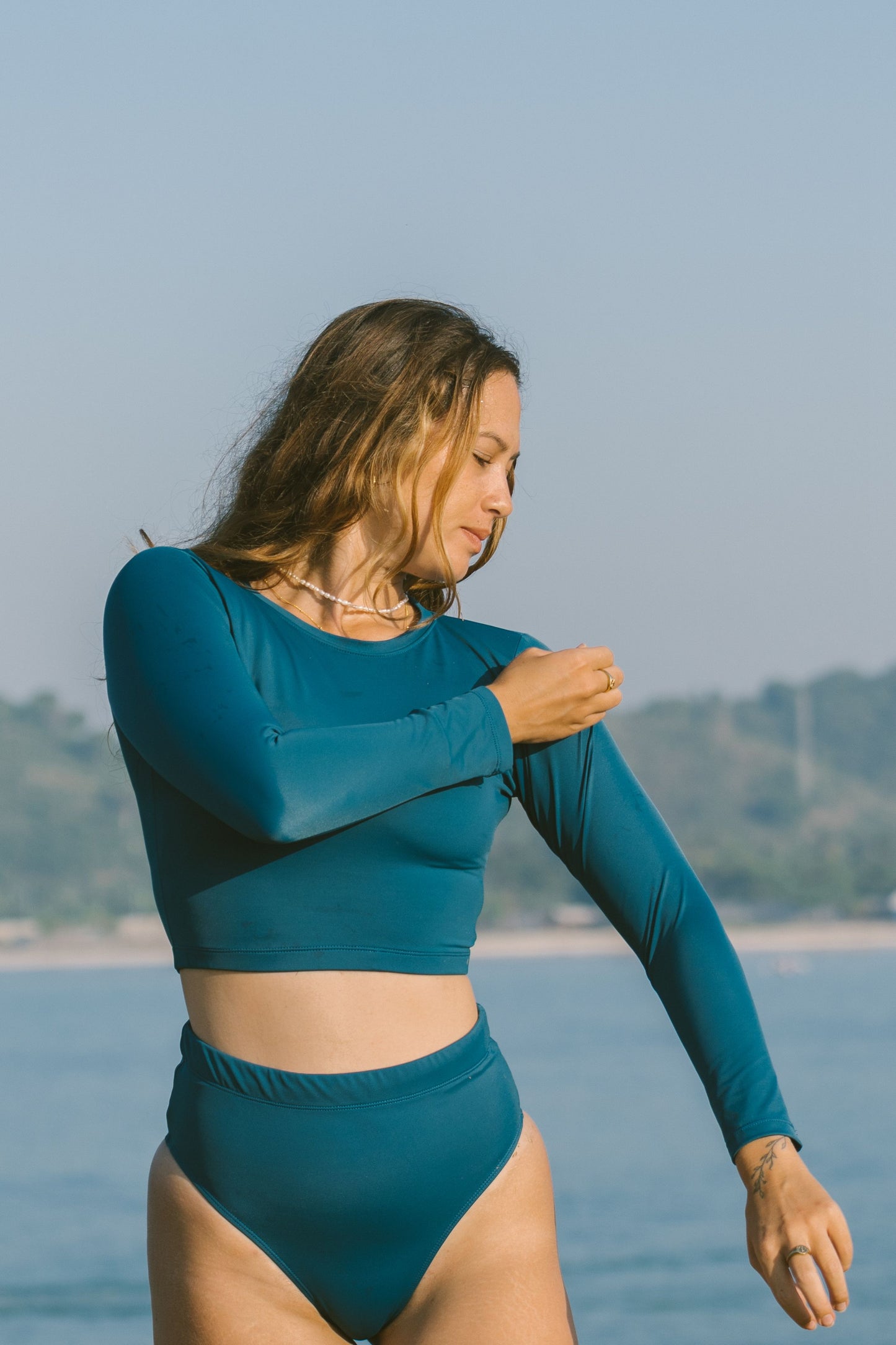 Noserider Cropped Rash Guard in Ocean Teal